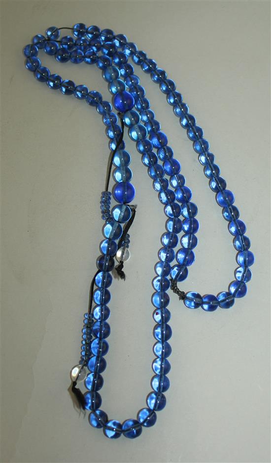 A Chinese blue glass bead Buddhist rosary, 65cm drop